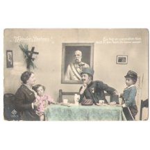 Rodina u stolu a na stěně obraz císaře F.J.I