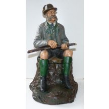 Sedící František Josef na pařezu - dóza na tabák 