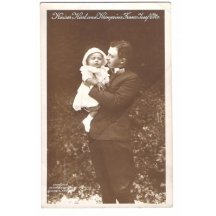 Emperor Karl is holding crown prince Franz Joseph Otto