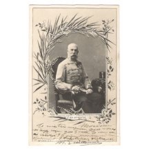 Franz Joseph sitting in chair
