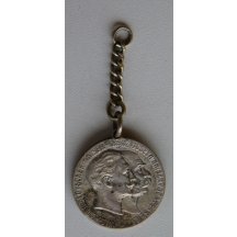 Císař František Josef na malé medaili